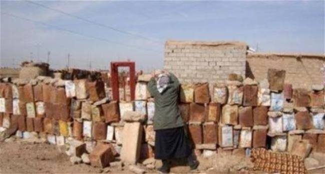 صورة المالكي يوزع ١٥٨٥ سند تمليك قطع أرض سكنية على  مستحقيها في ذي قار