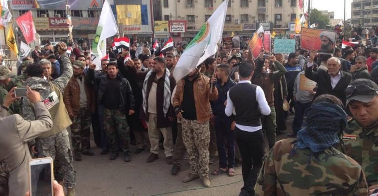 صورة تظاهرات شعبية وسط  بغداد احتجاجاً على اعدام الشيخ نمر النمر